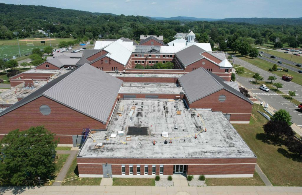 Work continues to repair roof damage at New Milford High, mayor says