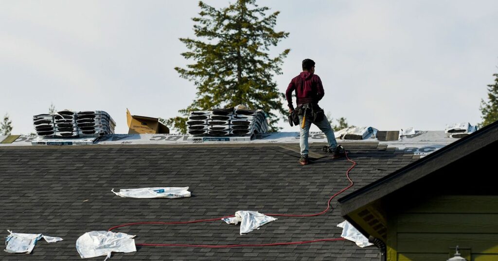 Contractors race to replace area roofs damaged by August hail storm before winter strikes