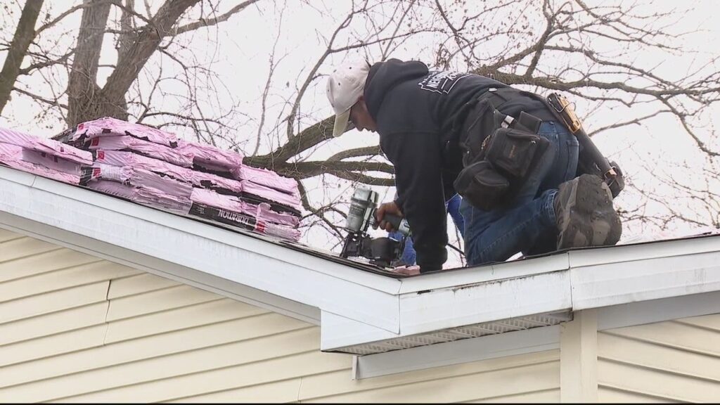 Marine vet receives new roof from Habitat for Humanity program to replace leaking, rotted roof