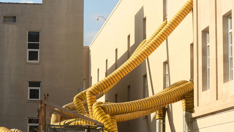 This 2020 picture shows blowers being used to dry out Wilmington's federal courthouse after it was damaged by the heavy rains and powerful winds of Hurricane Florence. Five years after the 2018 hurricane, the courthouse in downtown Wilmington remains closed.