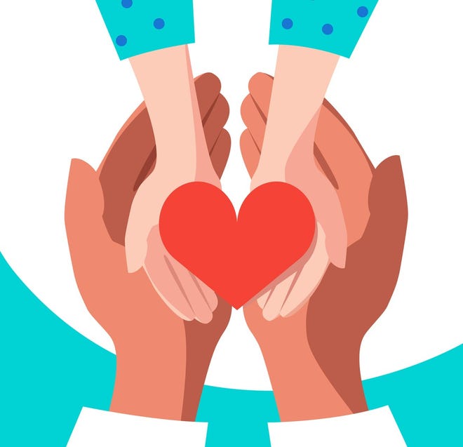 hands holding heart graphic