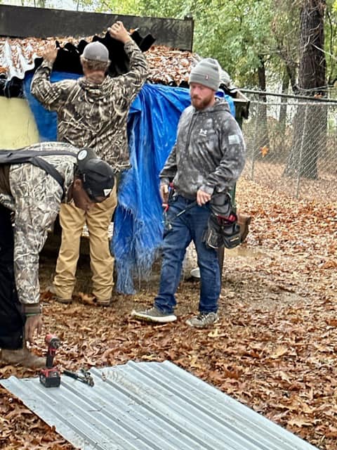 STEPPING UP TO SERVE: Two Local Businesses Volunteer To Make Repairs At Brookhaven Animal Shelter