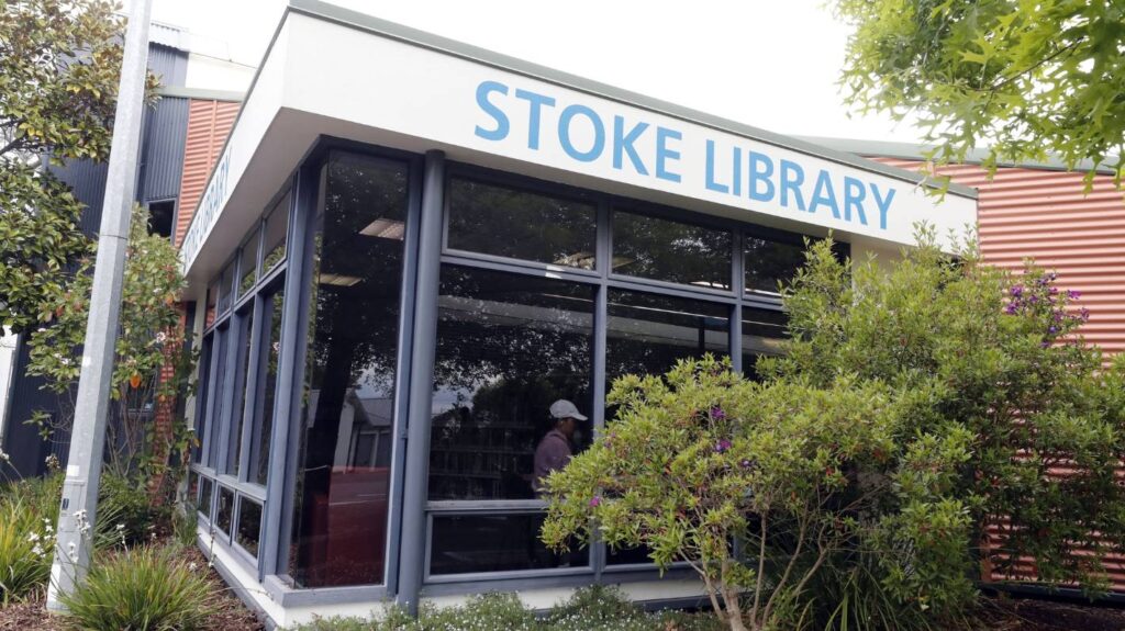 Staff cover books with tarpaulins and use buckets at leaky Stoke Library