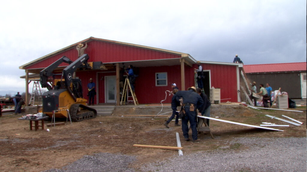 Mennonites rebuild Gallatin man's roof after insurance unknowingly cancelled